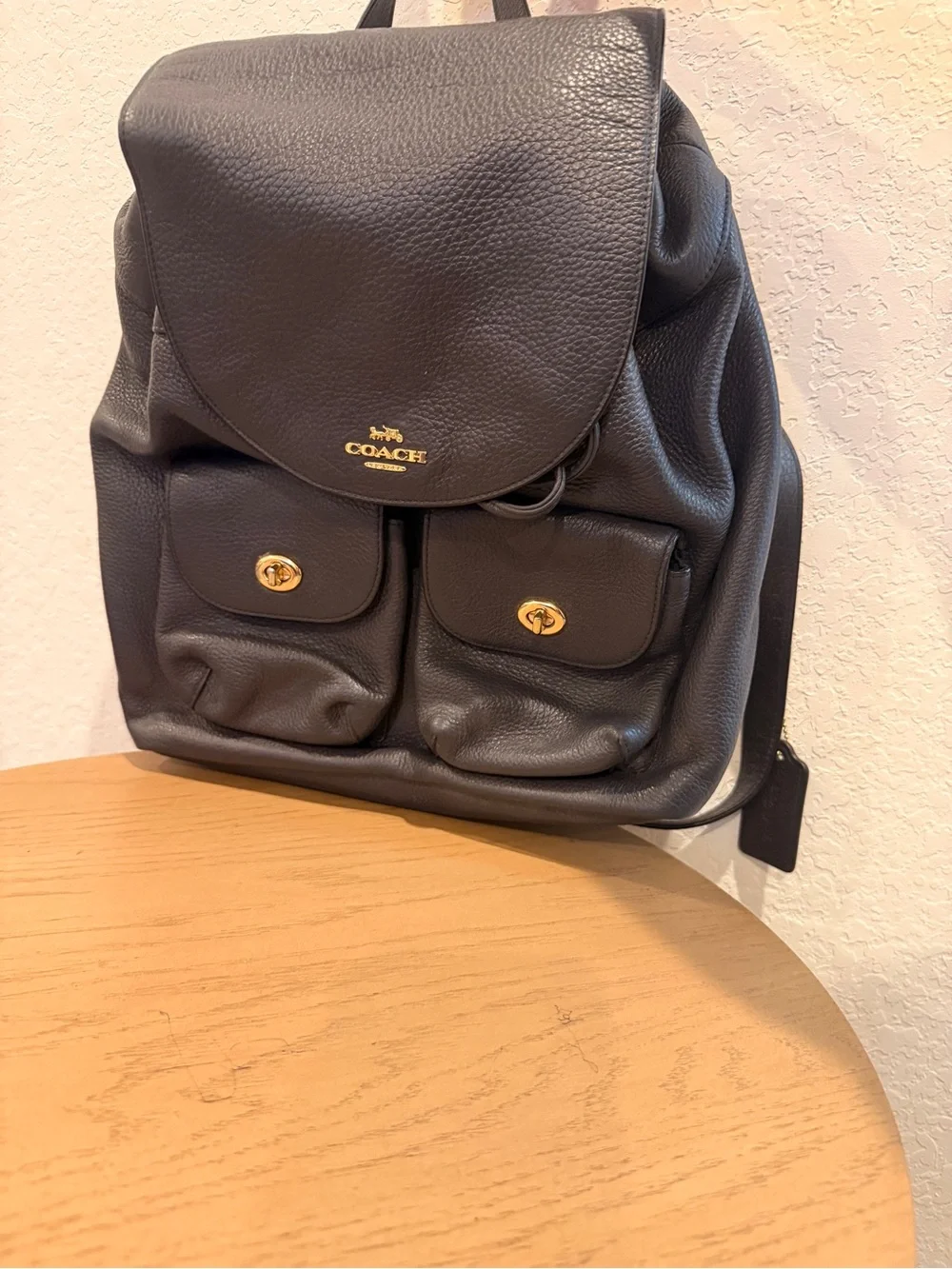 COACH Black Pebbled Leather Drawstring Backpack with Front Pockets